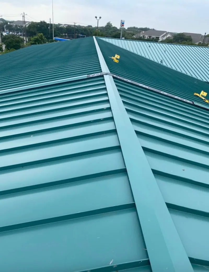 Green commercial metal roof ridge and valley for Metal Roof Repair in La Quinta